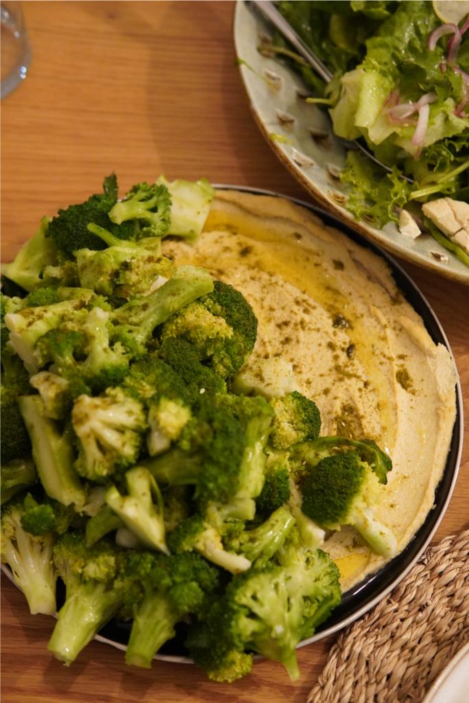 broccoli or brussels on a butter bean dip 